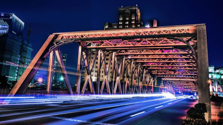 Light trails of traffic on busy bridge