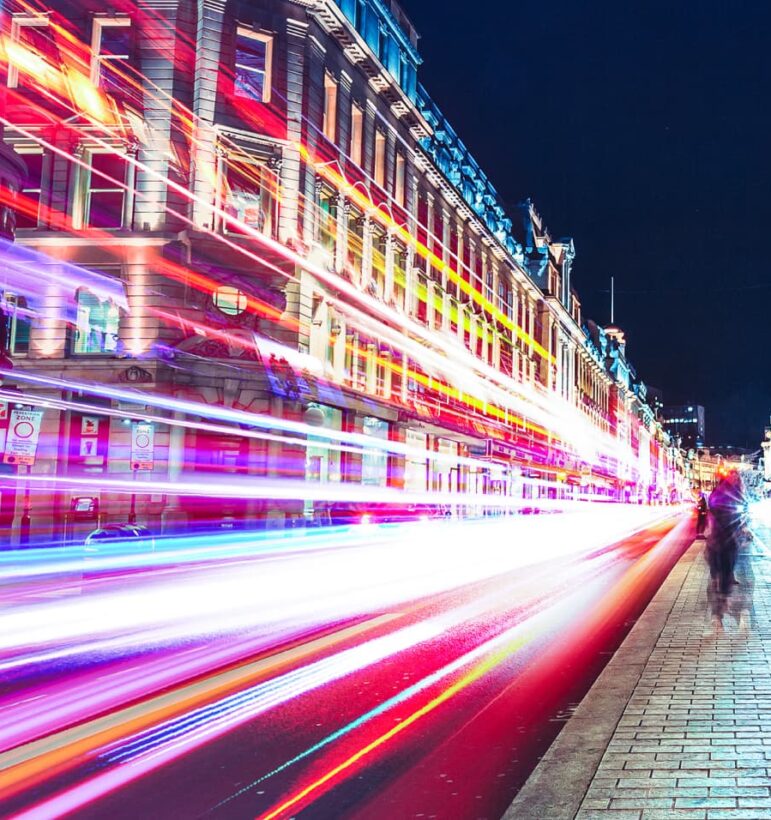 Light trails of traffic through city at night