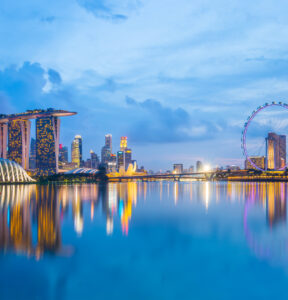 Singapore Skyline and view of Marina Bay at twilight.