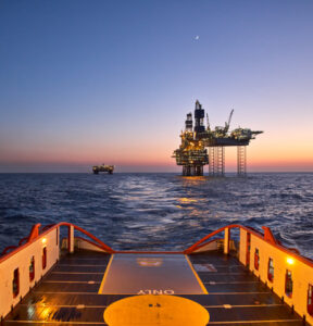 Supply vessel during cargo operations for Jack up drilling rig