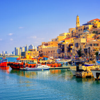 Old town and port of Jaffa and modern skyline of Tel Aviv city, Israel