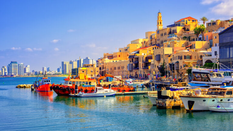 Old town and port of Jaffa and modern skyline of Tel Aviv city, Israel