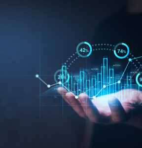 Business strategy and digital marketing concept. Businessman holding economic growth graph financial data.Stock market investment. Financial and banking Technology