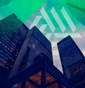 View of tall buildings from the ground looking up at the sky